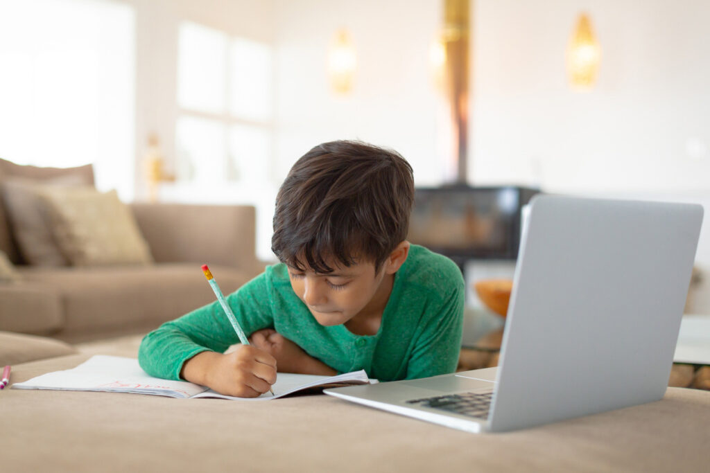 EDUPRIZE Online student completing coursework from home, building self-paced study habits with digital support.