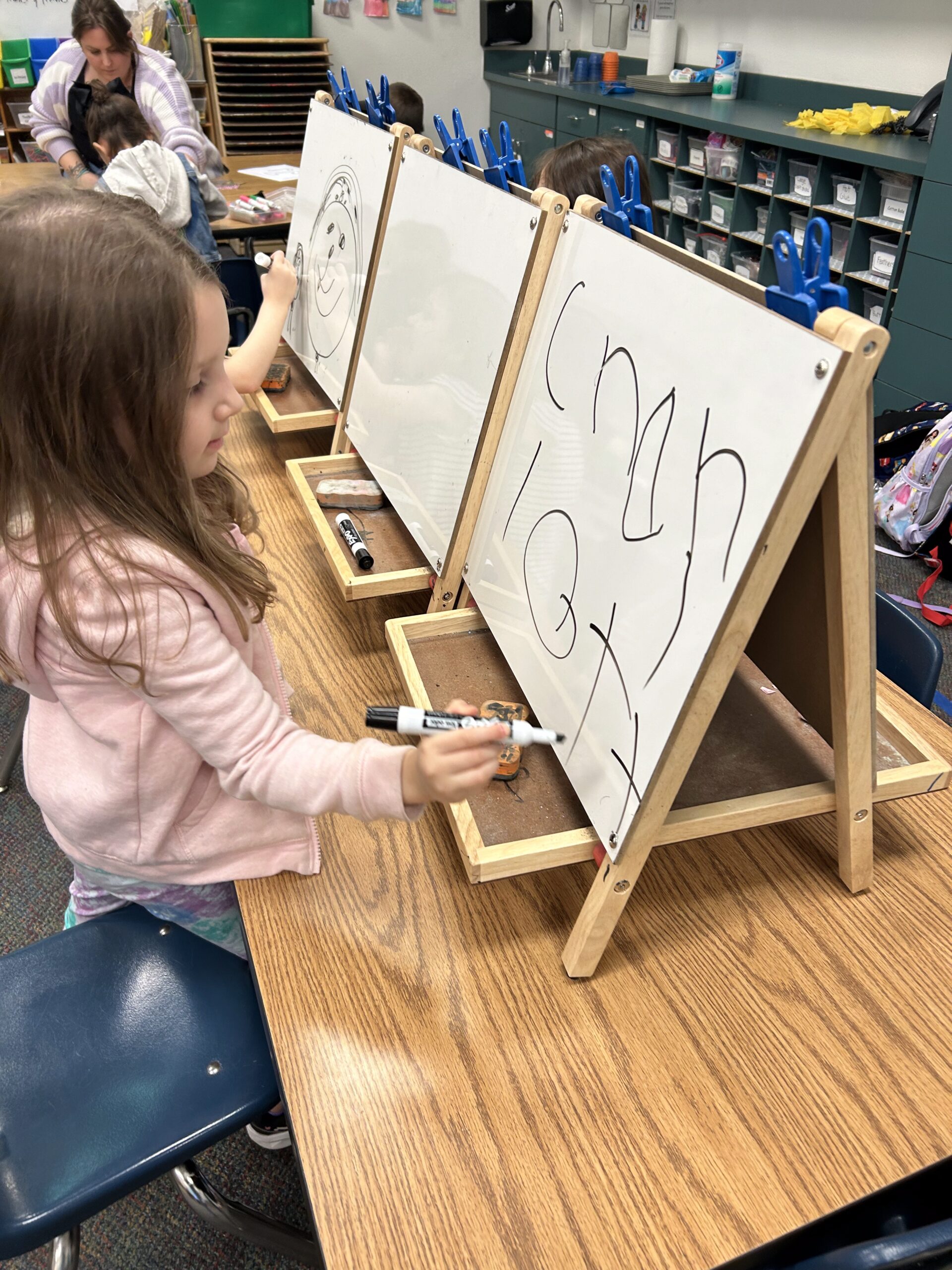 EDUPRIZE Pre-K students engaging with teacher