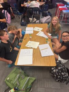 A student working on a hands-on math activity at an EDUPRIZE Arizona charter school