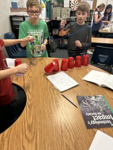 Students exploring a hands-on STEM activity at an EDUPRIZE Arizona charter school