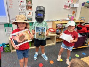 A new student smiling with classmates at an EDUPRIZE Arizona charter school