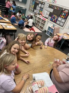 A curious, happy student enjoying a lesson at an EDUPRIZE Arizona charter school